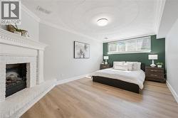 Recessed ceiling with decorative medallion and flush-mount lighting -