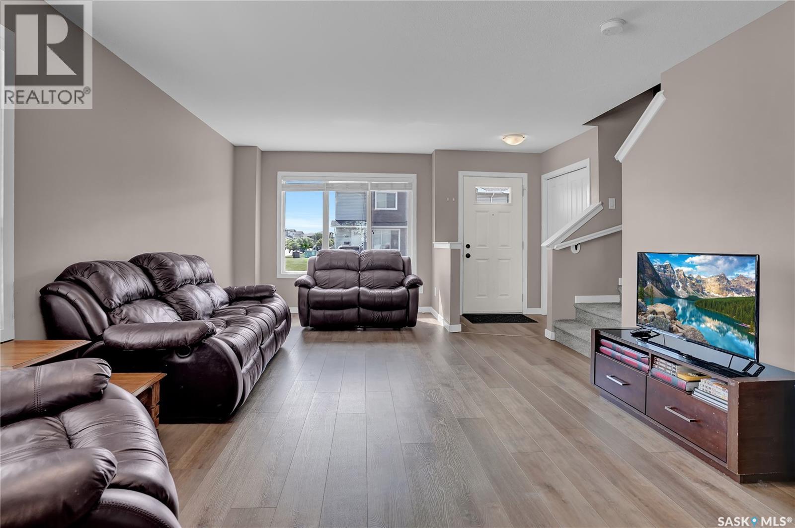 68 4850 Harbour Landing Drive, Regina, SK - Indoor Photo Showing Living Room