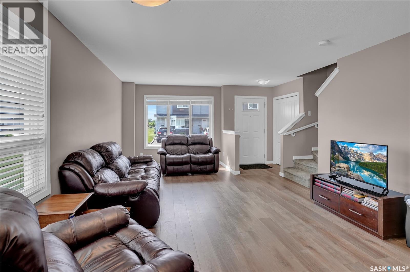 68 4850 Harbour Landing Drive, Regina, SK - Indoor Photo Showing Living Room