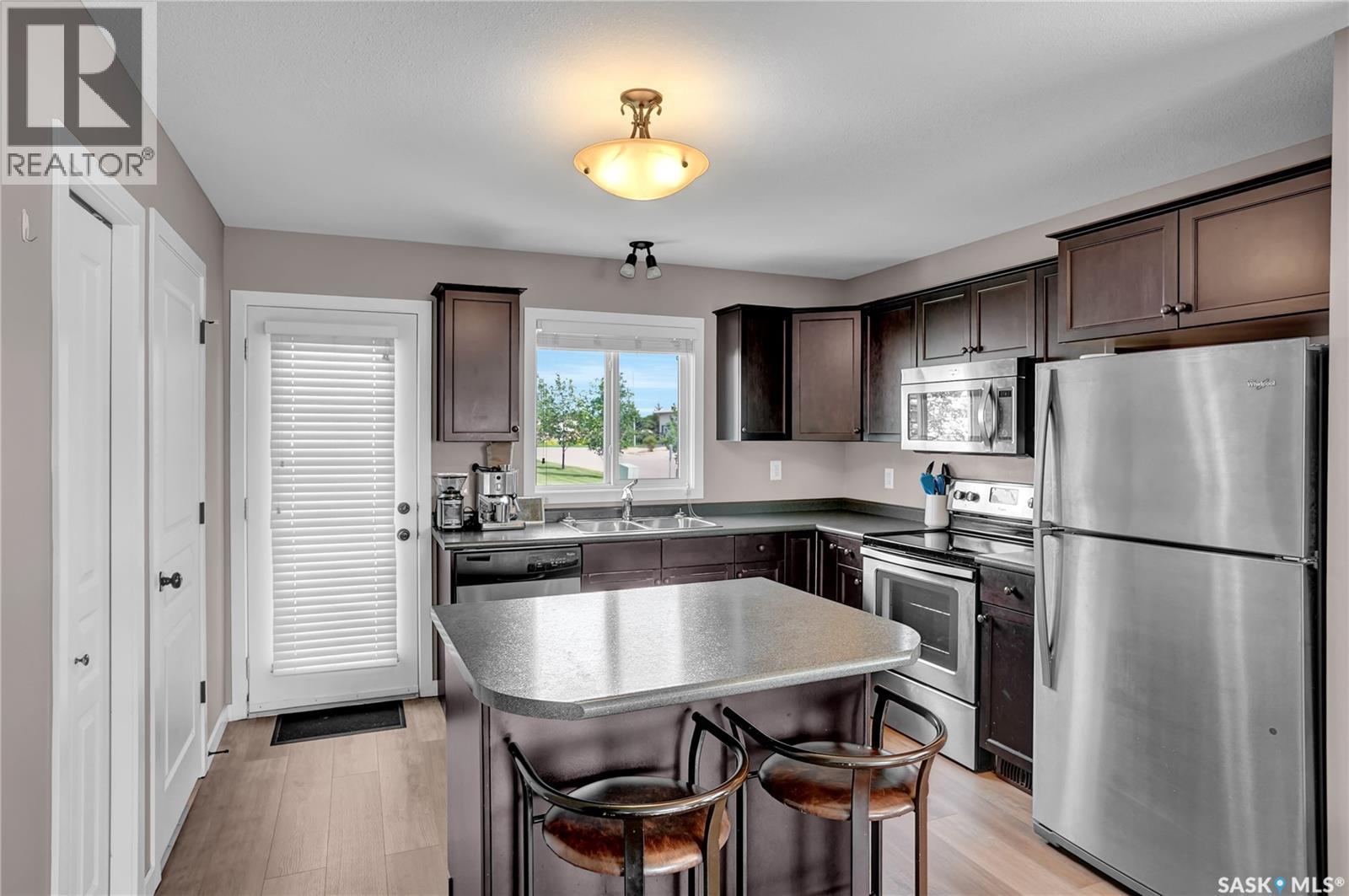 68 4850 Harbour Landing Drive, Regina, SK - Indoor Photo Showing Kitchen
