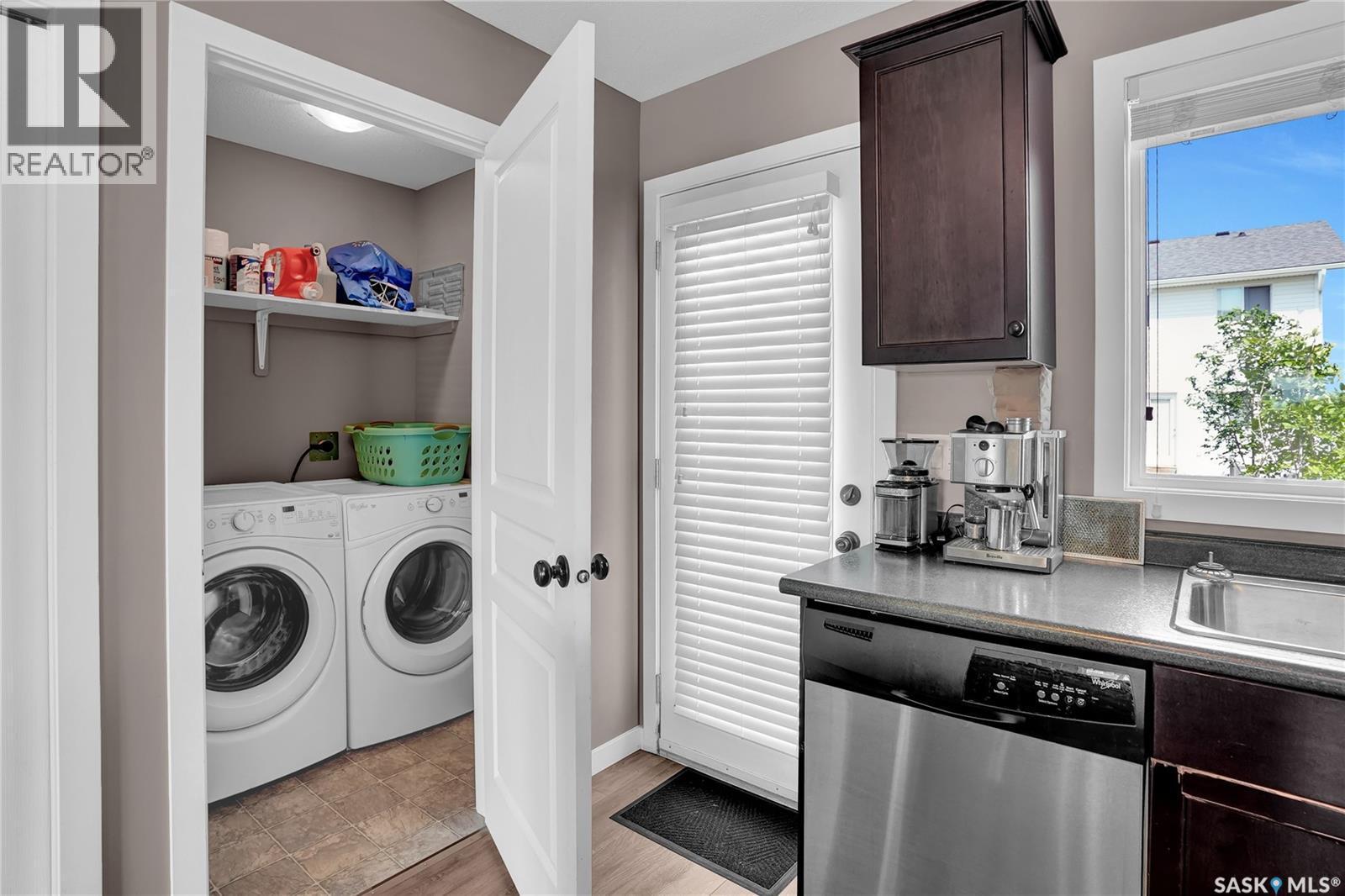 68 4850 Harbour Landing Drive, Regina, SK - Indoor Photo Showing Laundry Room