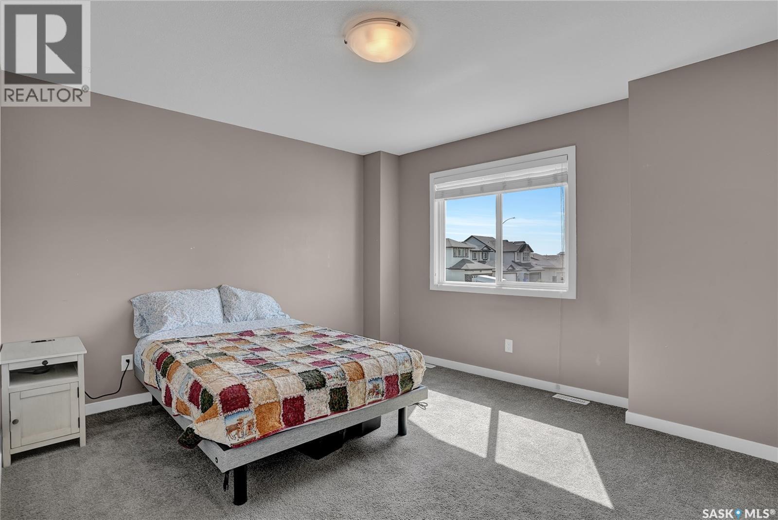 68 4850 Harbour Landing Drive, Regina, SK - Indoor Photo Showing Bedroom