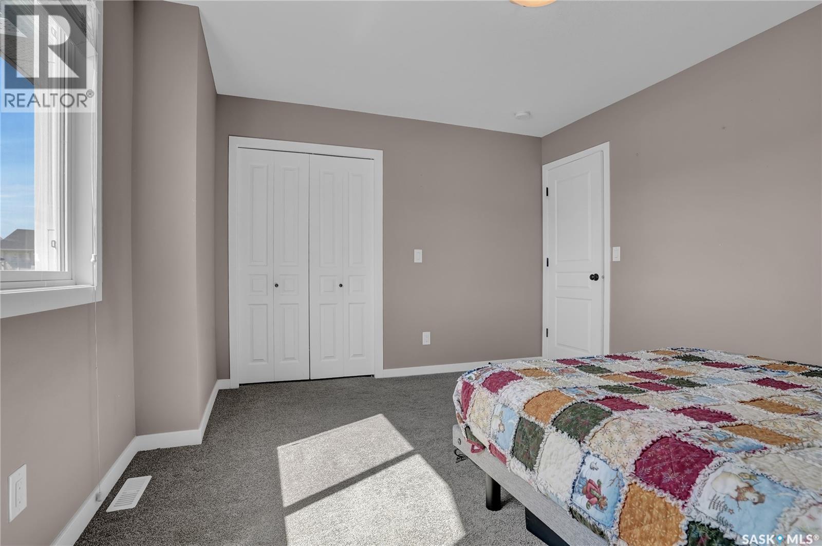 68 4850 Harbour Landing Drive, Regina, SK - Indoor Photo Showing Bedroom