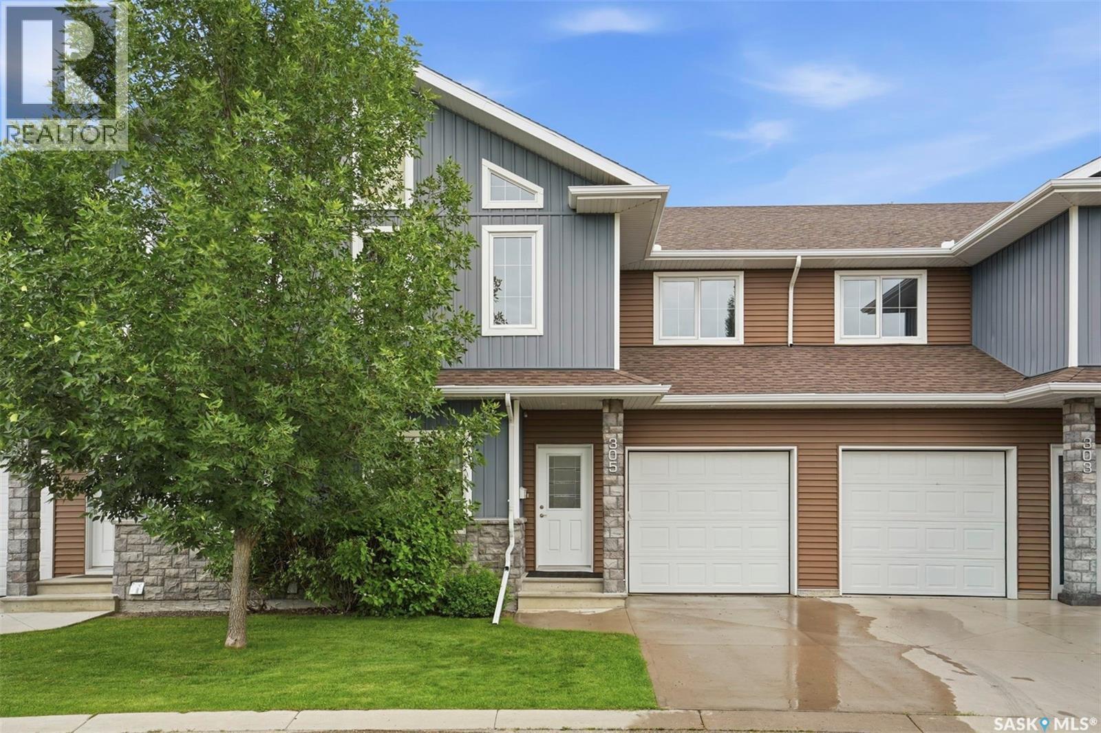 305 315 Zary Road, Saskatoon, SK - Outdoor With Facade