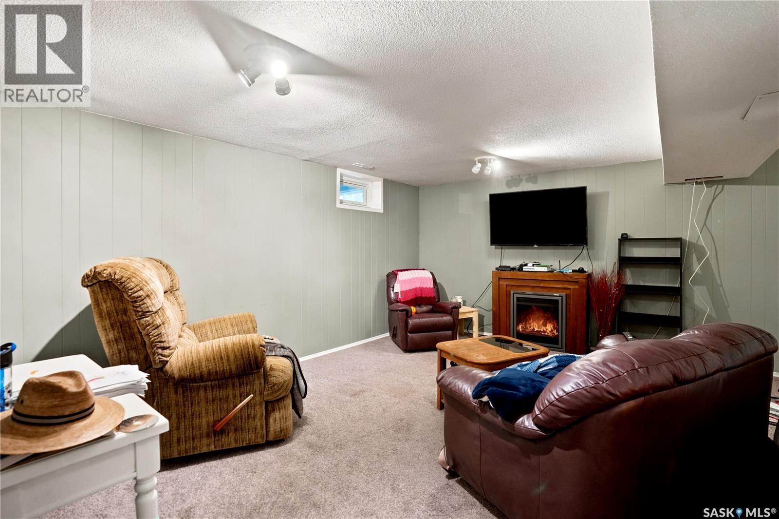 1313 Prince Crescent, Moose Jaw, SK - Indoor Photo Showing Basement With Fireplace