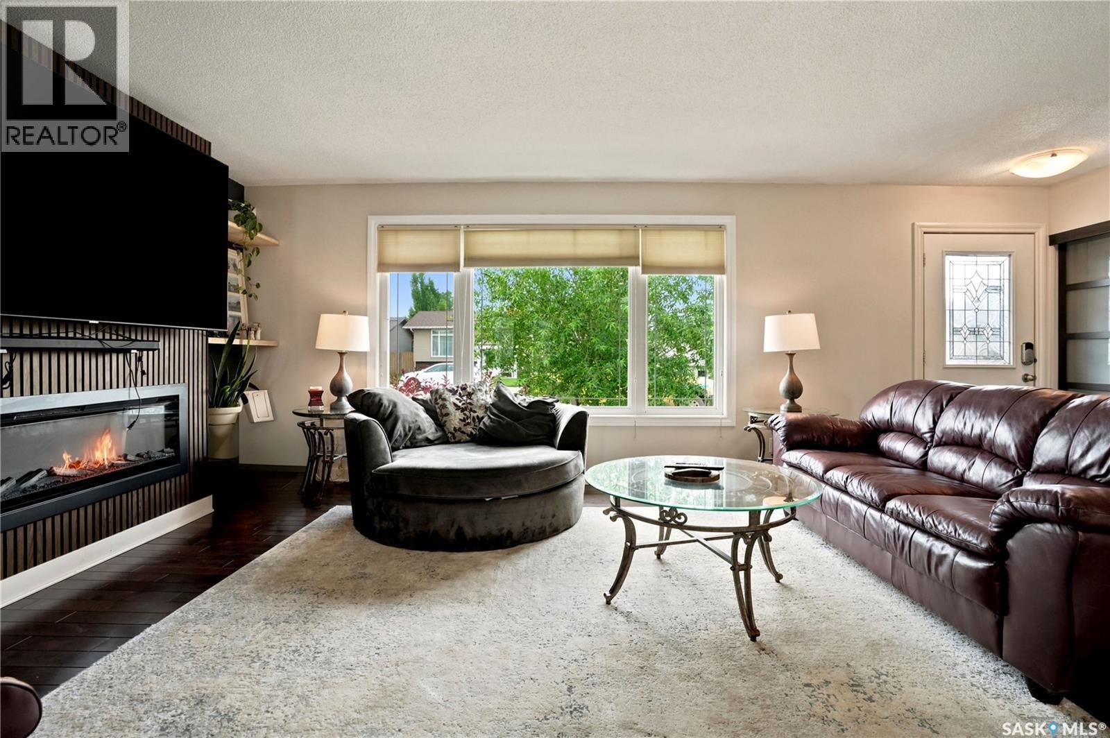 1313 Prince Crescent, Moose Jaw, SK - Indoor Photo Showing Living Room With Fireplace