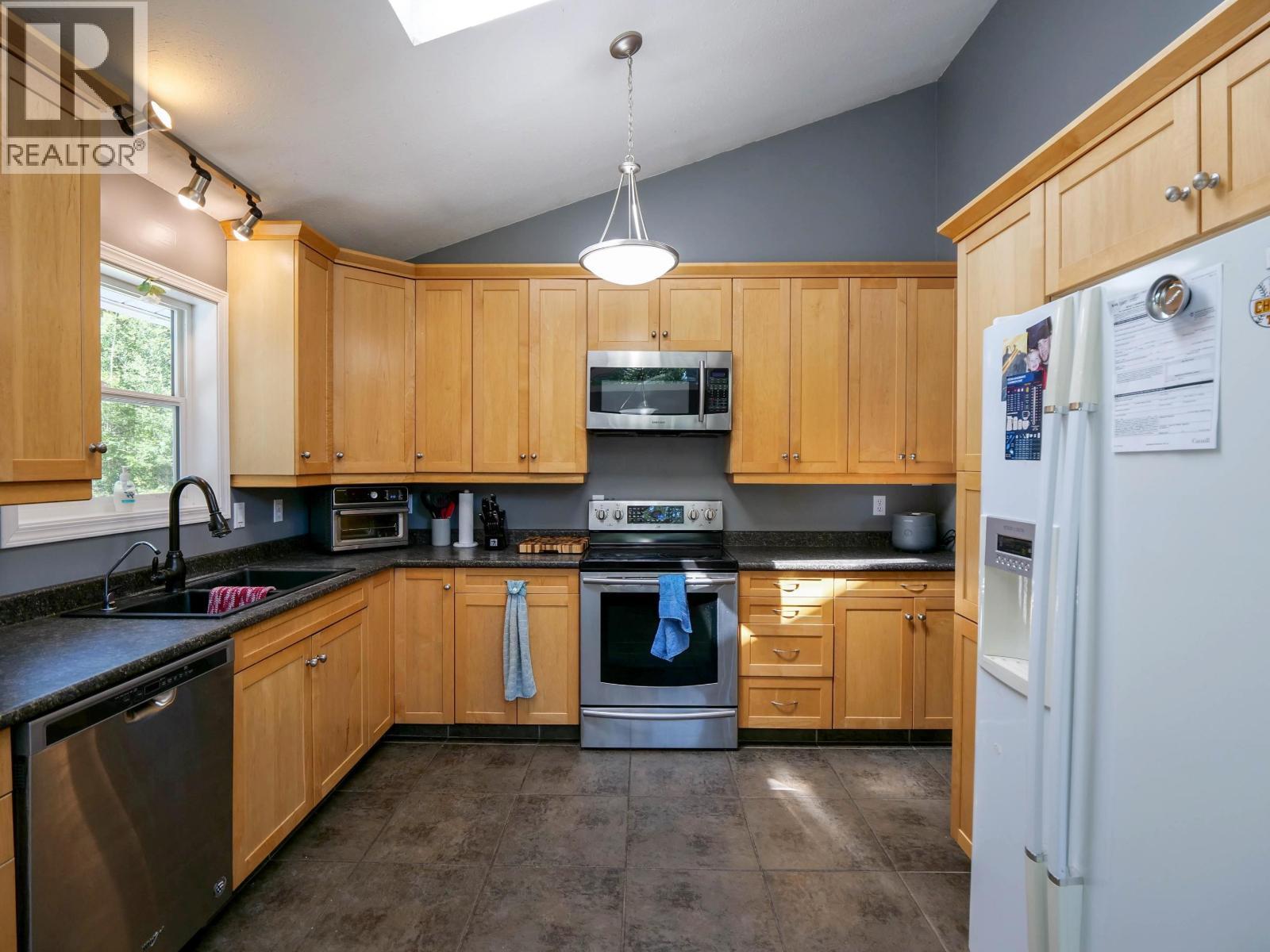 3482 Kirkham Road, Quesnel, BC - Indoor Photo Showing Kitchen With Stainless Steel Kitchen With Double Sink