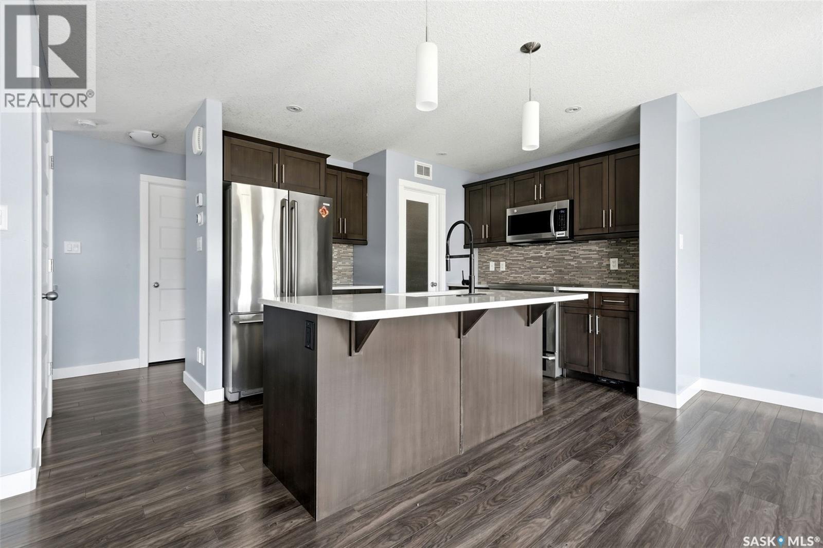 4354 Green Olive Way E, Regina, SK - Indoor Photo Showing Kitchen With Upgraded Kitchen