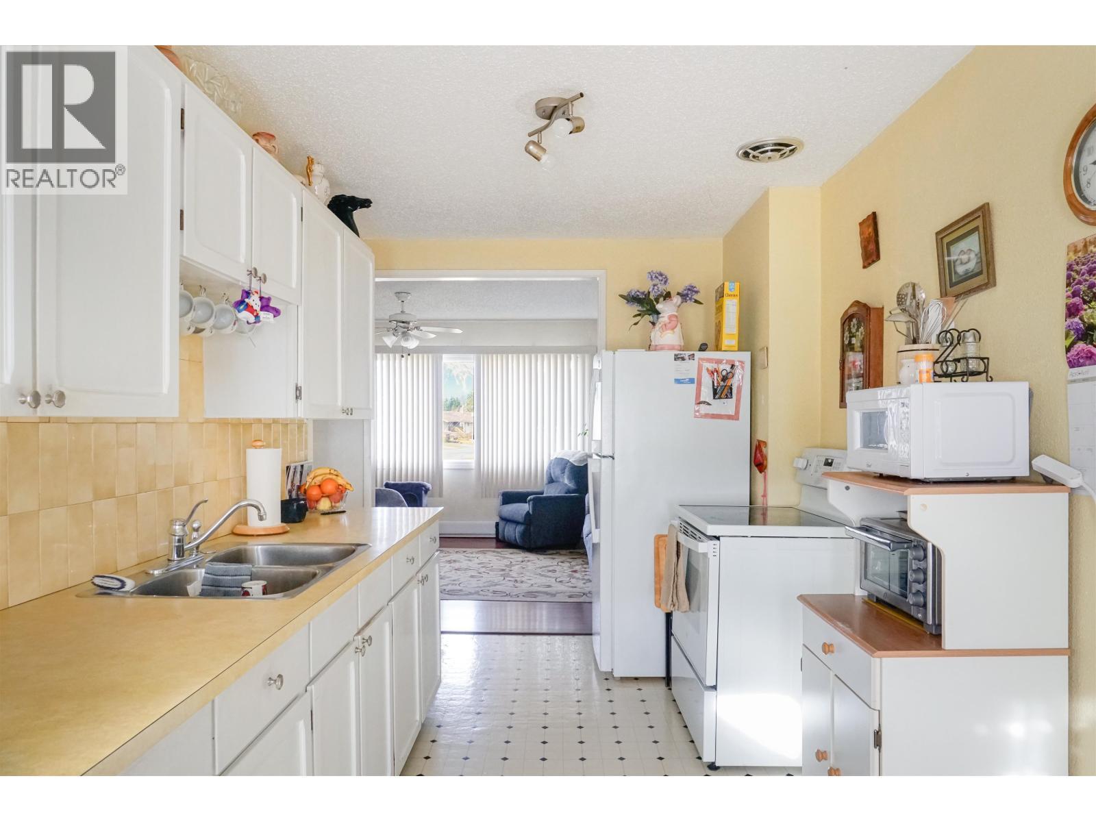 5 Grebe Street, Kitimat, BC - Indoor Photo Showing Kitchen With Double Sink