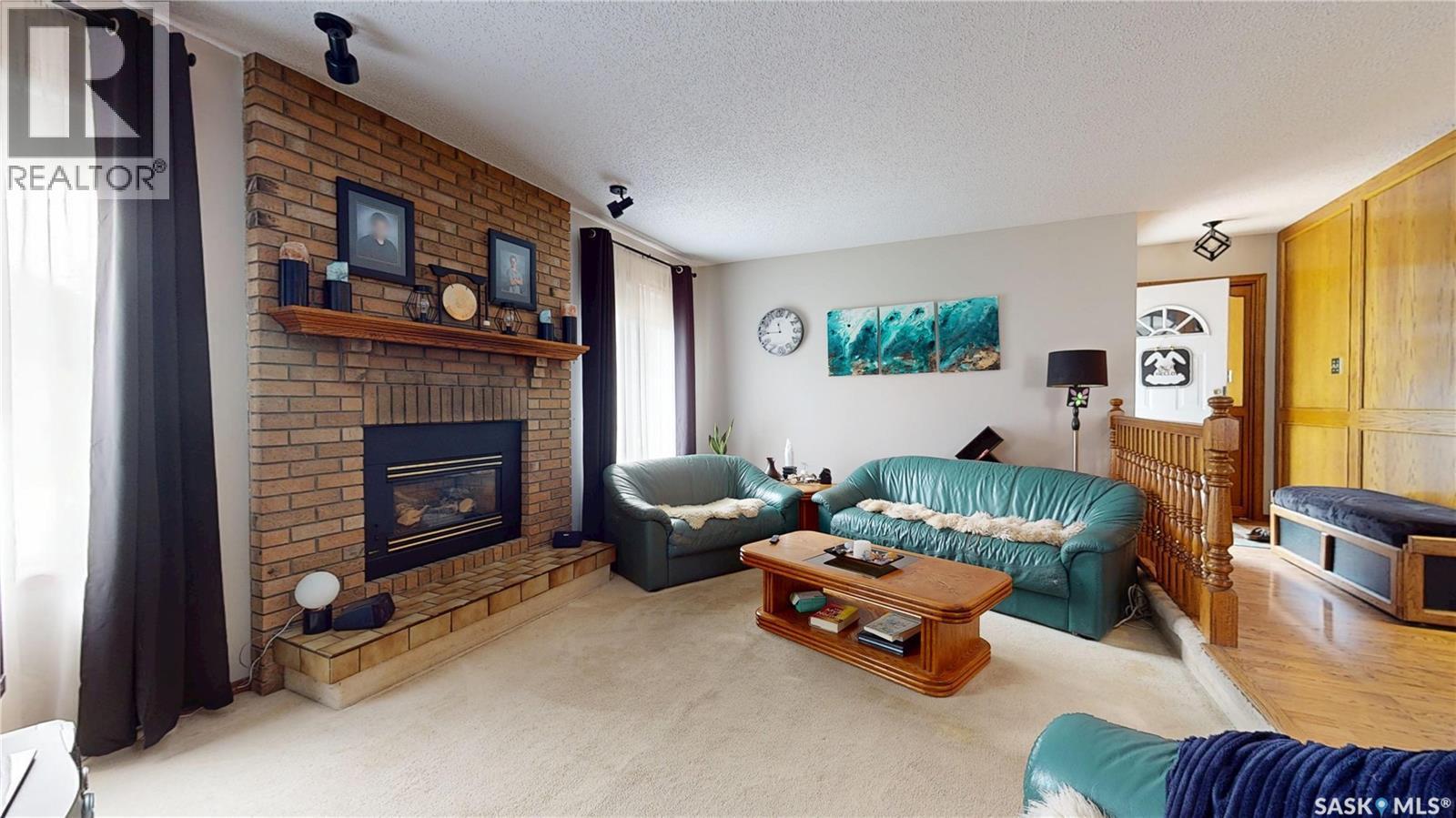 1358 Lakewood Crescent N, Regina, SK - Indoor Photo Showing Living Room With Fireplace
