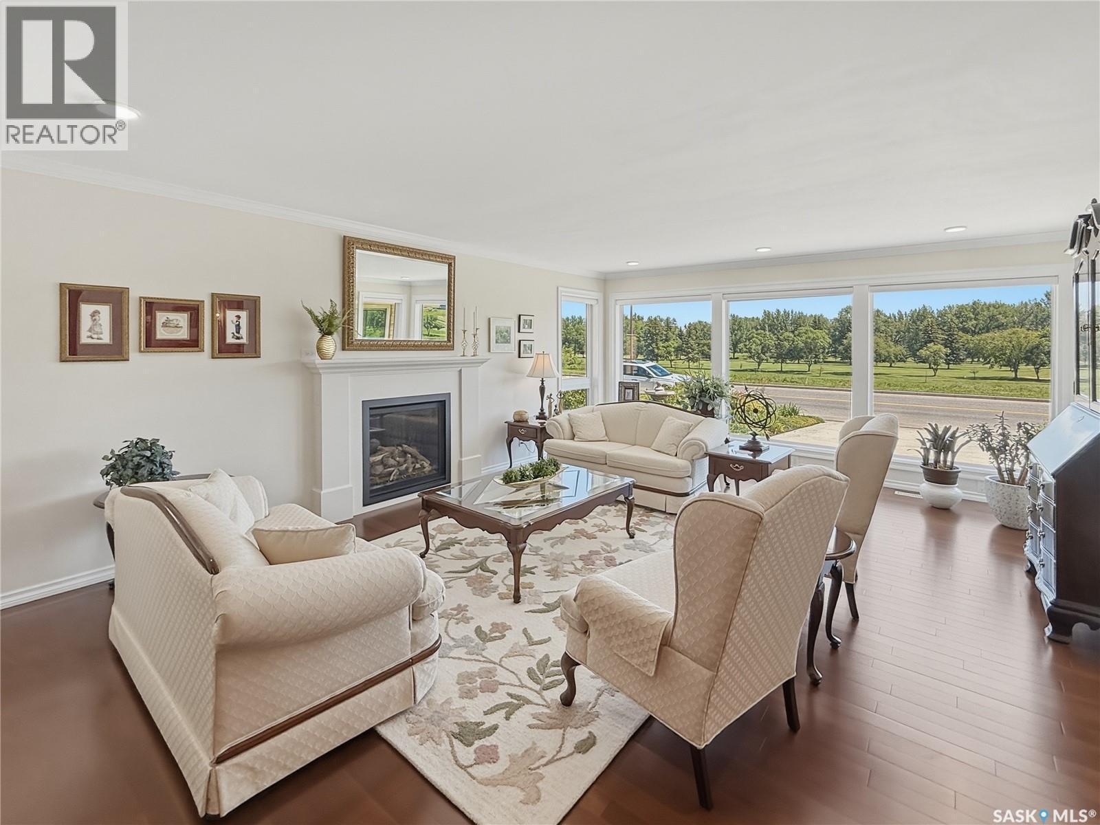 1165 North Hill Drive, Swift Current, SK - Indoor Photo Showing Living Room With Fireplace