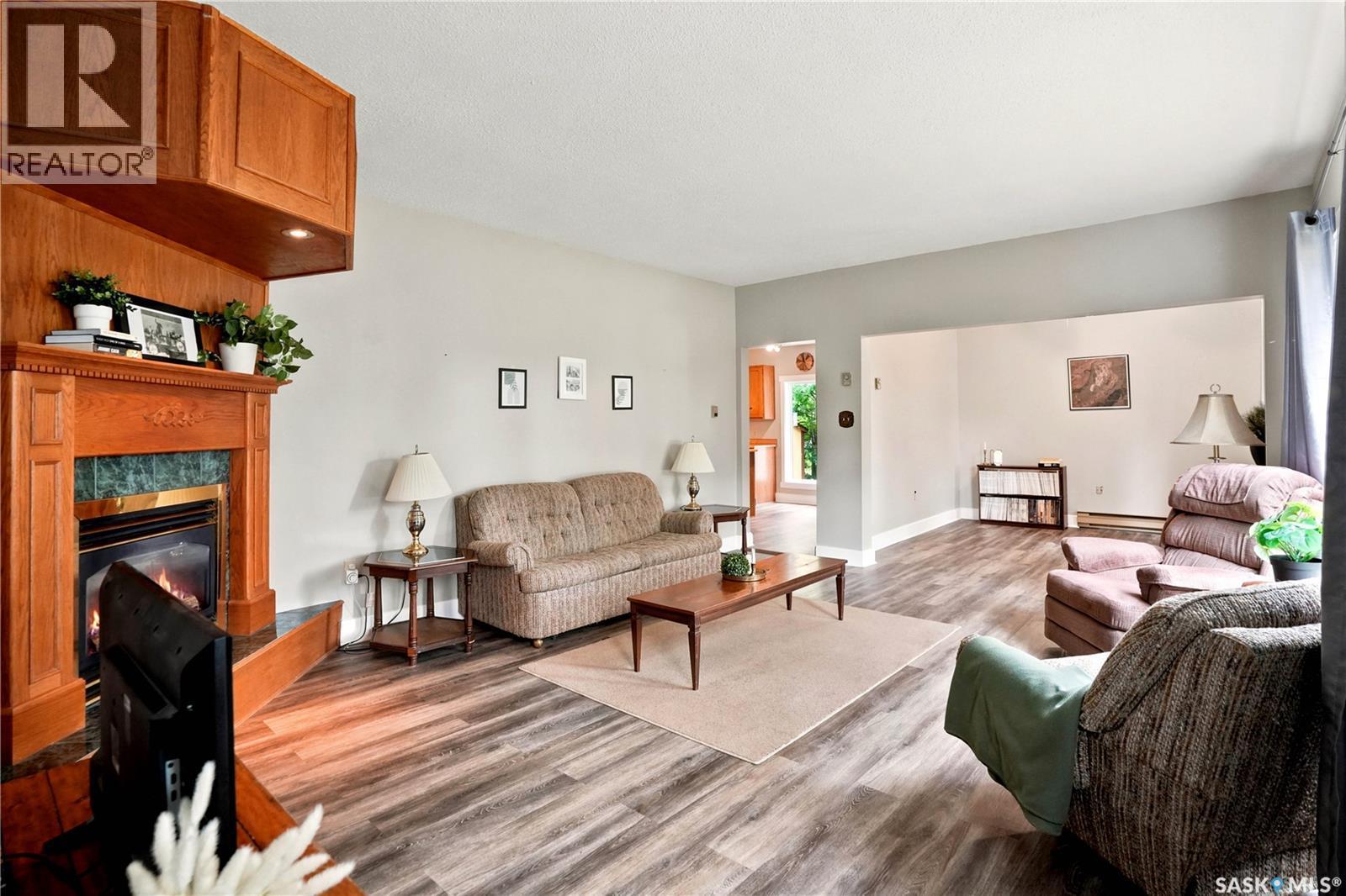 300 Main Street, Dysart, SK - Indoor Photo Showing Living Room With Fireplace