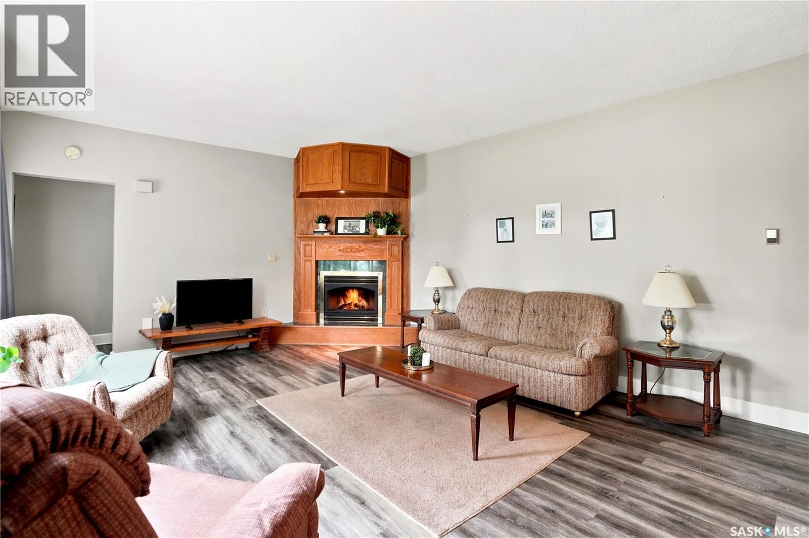 300 Main Street, Dysart, SK - Indoor Photo Showing Living Room With Fireplace