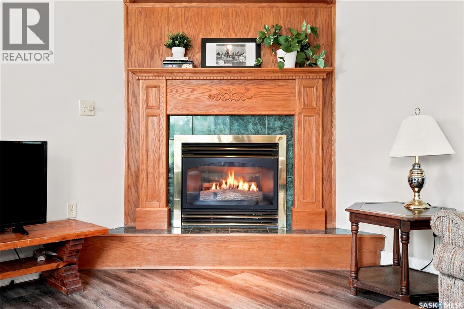 300 Main Street, Dysart, SK - Indoor Photo Showing Living Room With Fireplace