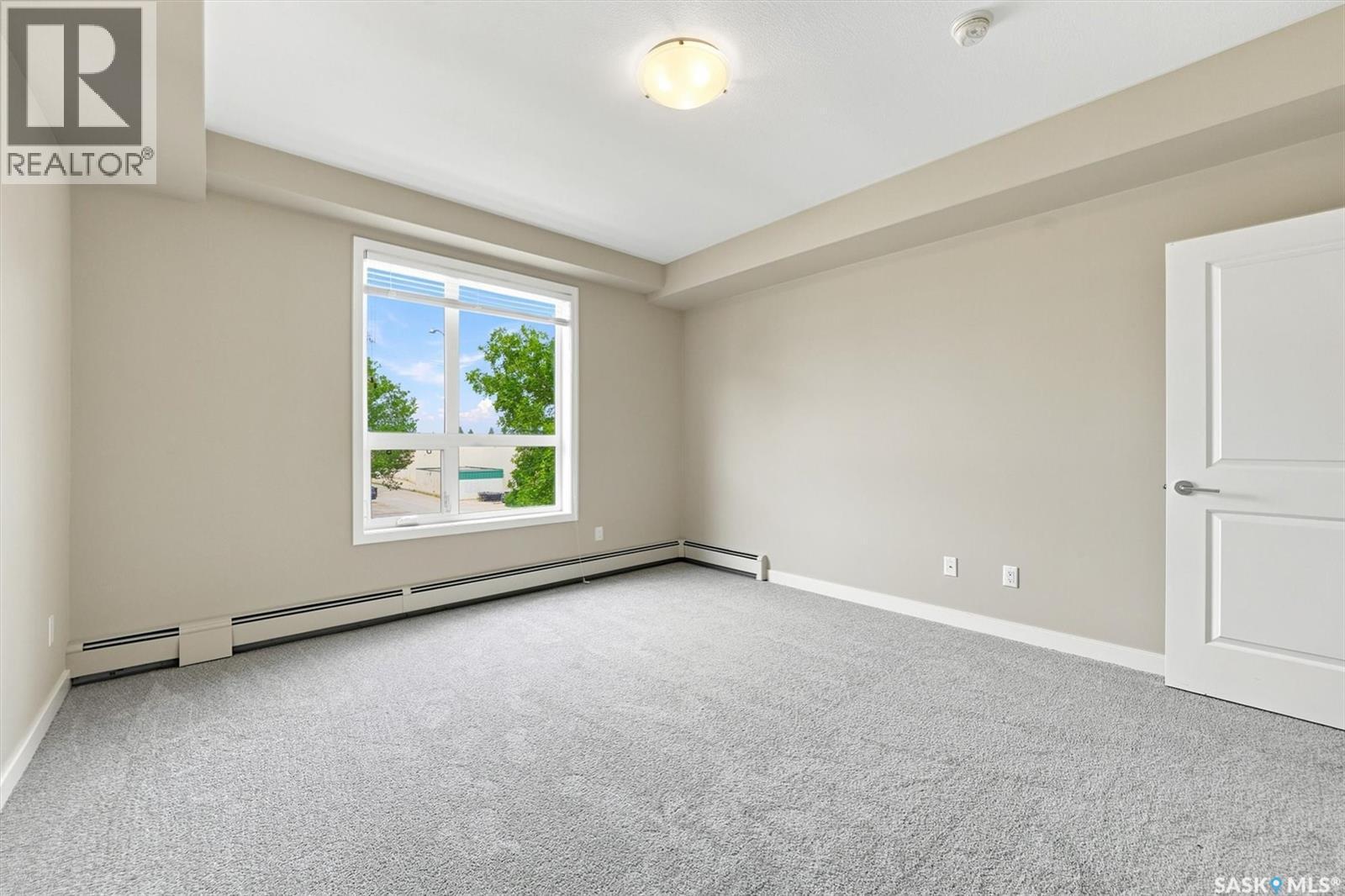 210 1015 Moss Avenue, Saskatoon, SK - Indoor Photo Showing Other Room