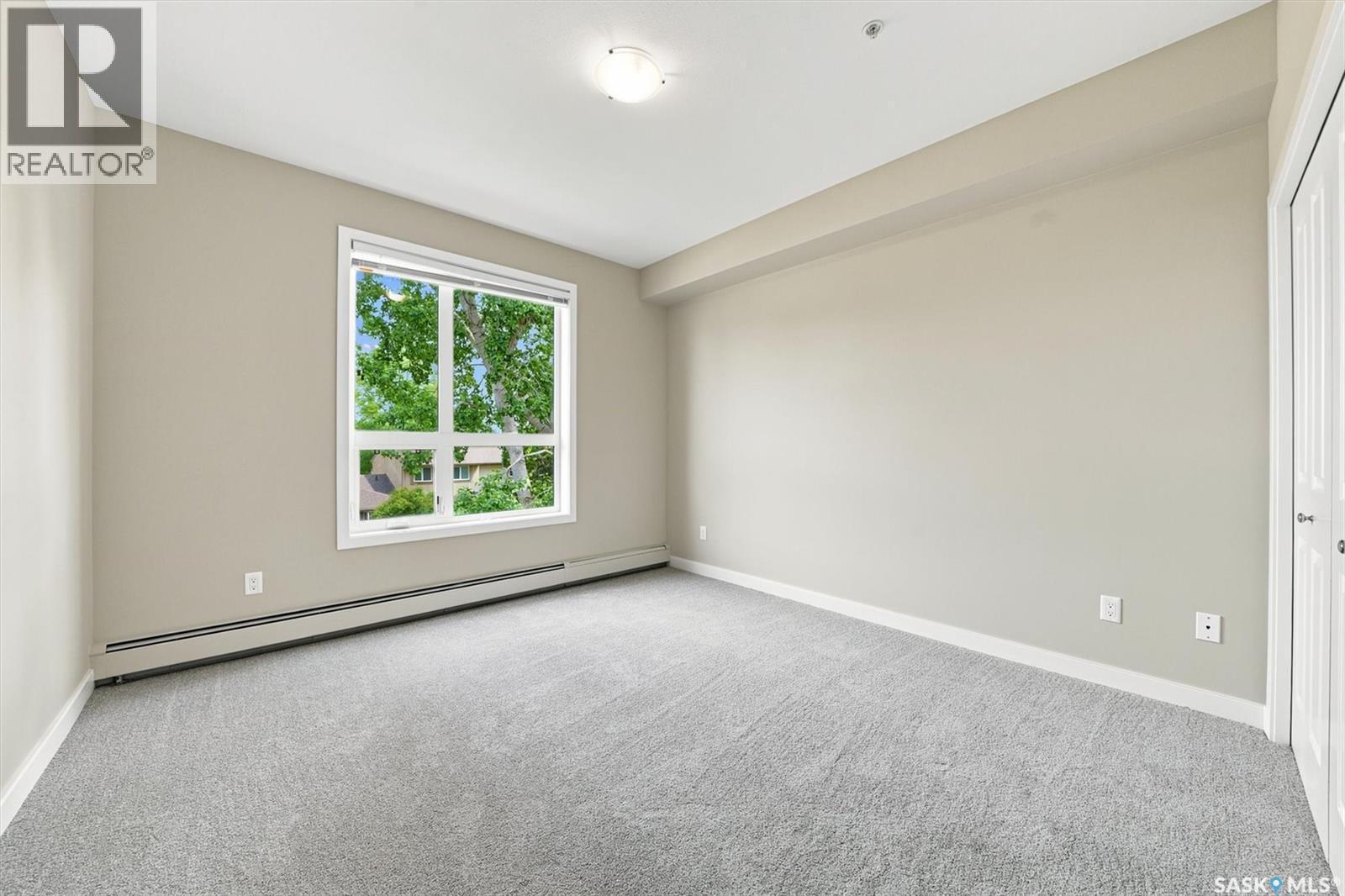 210 1015 Moss Avenue, Saskatoon, SK - Indoor Photo Showing Other Room