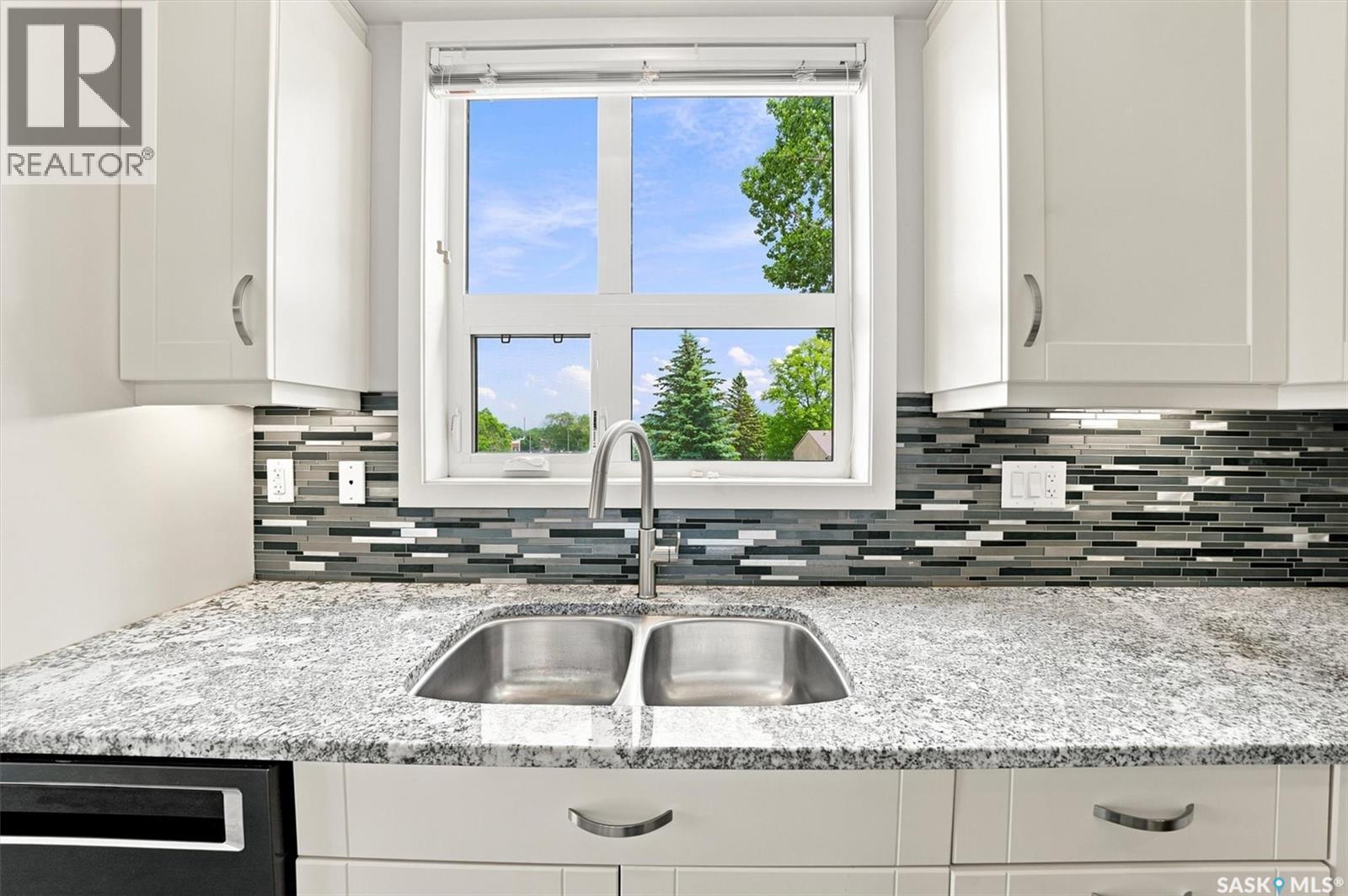 210 1015 Moss Avenue, Saskatoon, SK - Indoor Photo Showing Kitchen With Double Sink With Upgraded Kitchen