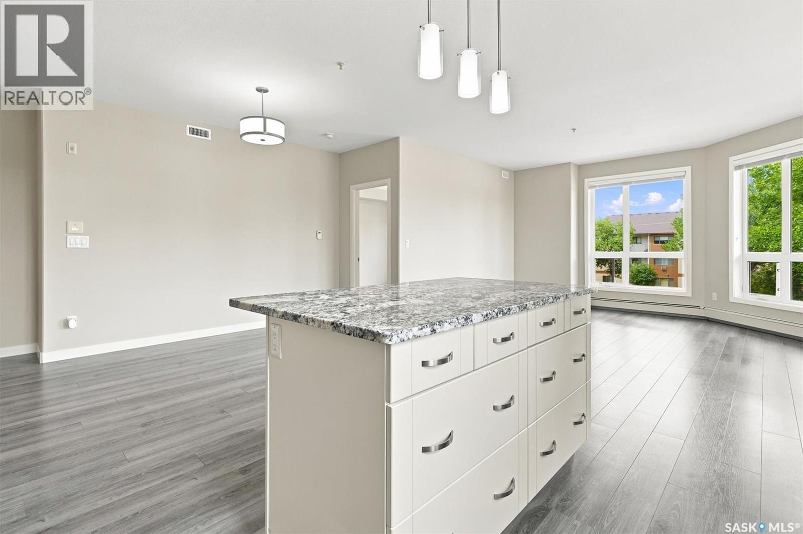210 1015 Moss Avenue, Saskatoon, SK - Indoor Photo Showing Kitchen With Upgraded Kitchen
