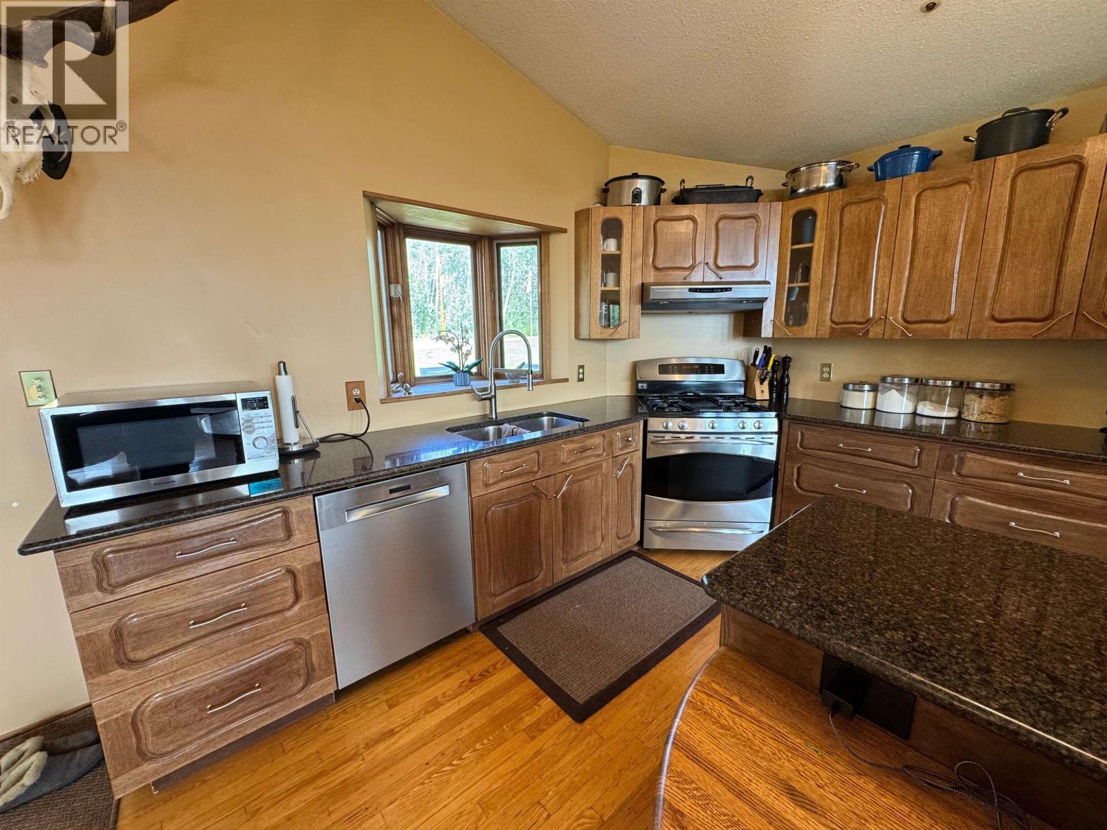 15562 287 Road, Fort St. John, BC - Indoor Photo Showing Kitchen With Double Sink