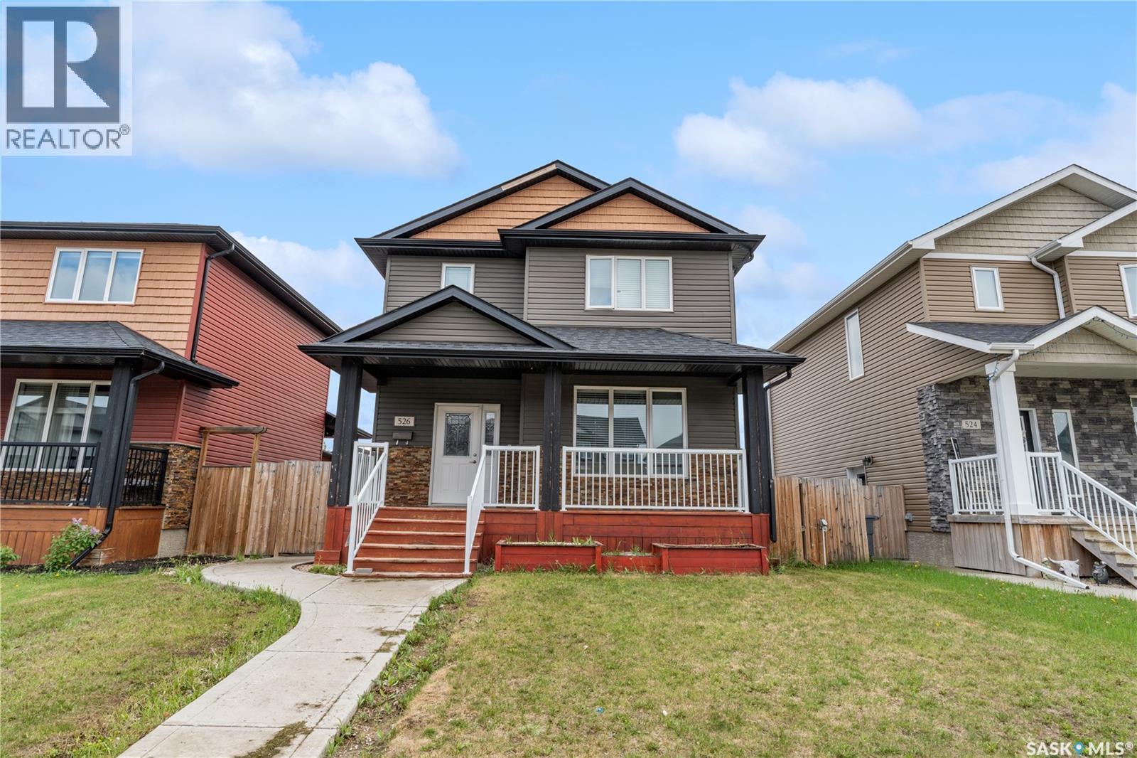 526 Maple Crescent, Warman, SK - Outdoor With Deck Patio Veranda With Facade