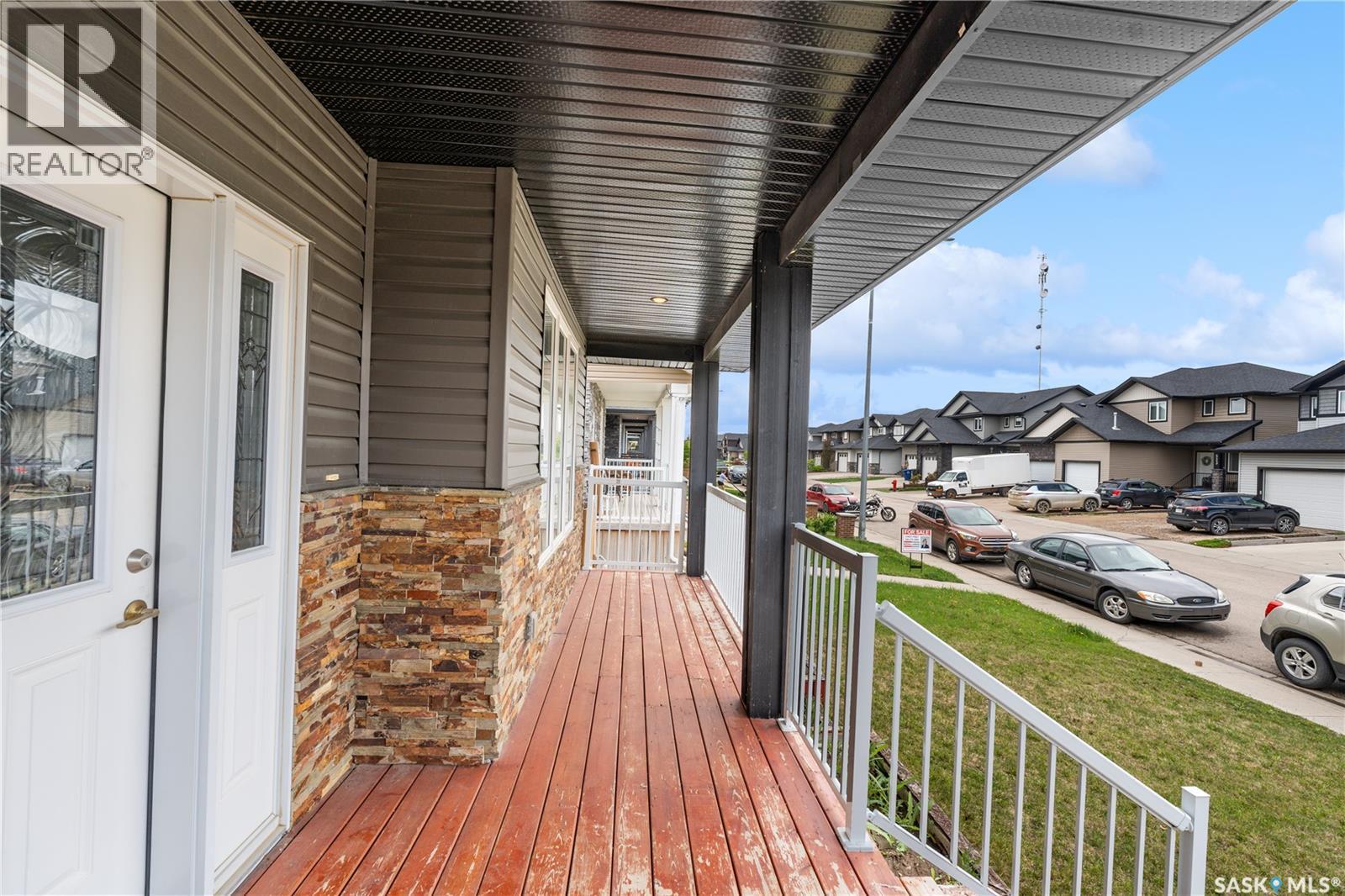 526 Maple Crescent, Warman, SK - Outdoor With Deck Patio Veranda With Exterior
