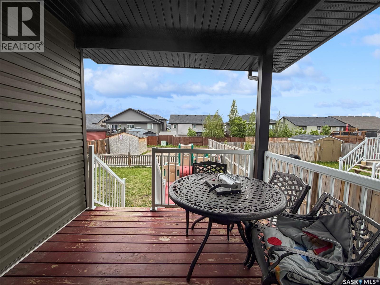 526 Maple Crescent, Warman, SK - Outdoor With Deck Patio Veranda With Exterior