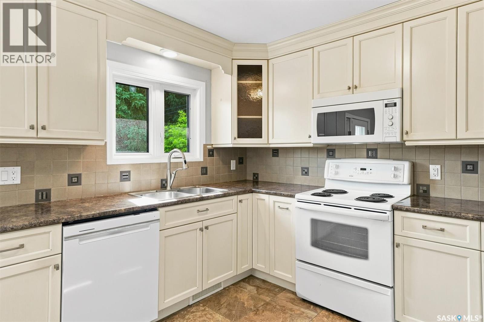 144 Sylvite Crescent, Allan, SK - Indoor Photo Showing Kitchen With Double Sink