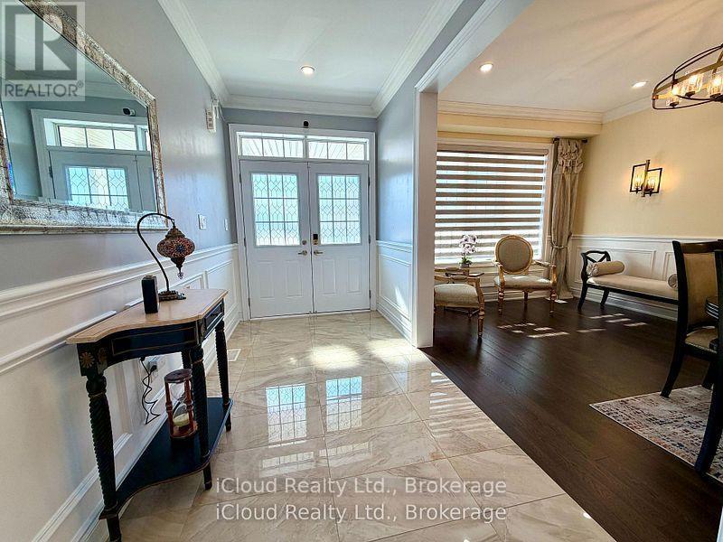 Elegant wainscoting and crown moulding - 56 Esther Crescent, Thorold, ON - Indoor Photo Showing Other Room