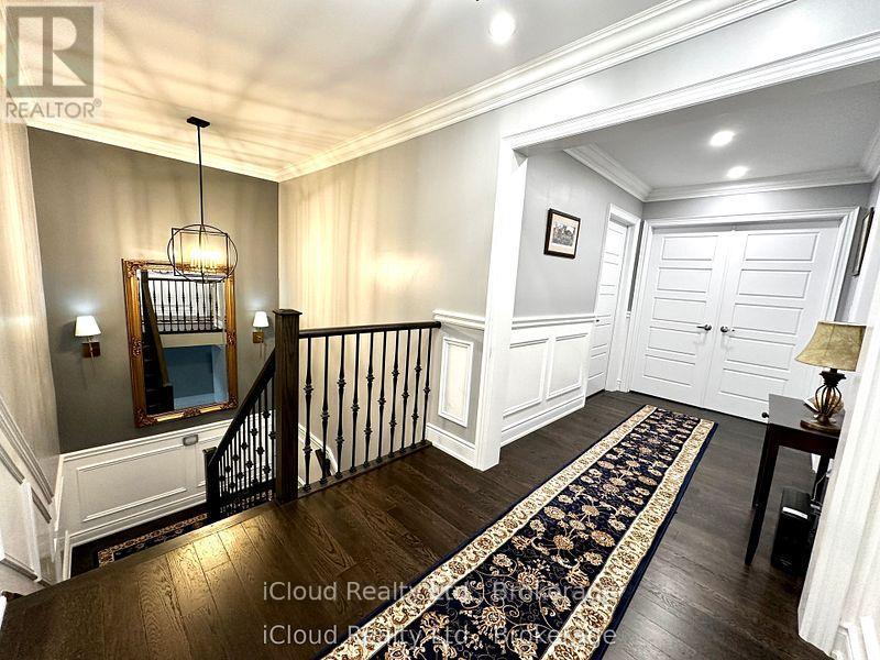 iron pickets, smooth ceilings, upgraded trim - 56 Esther Crescent, Thorold, ON - Indoor Photo Showing Other Room