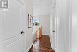 natural light flooding staircase & hallway - 