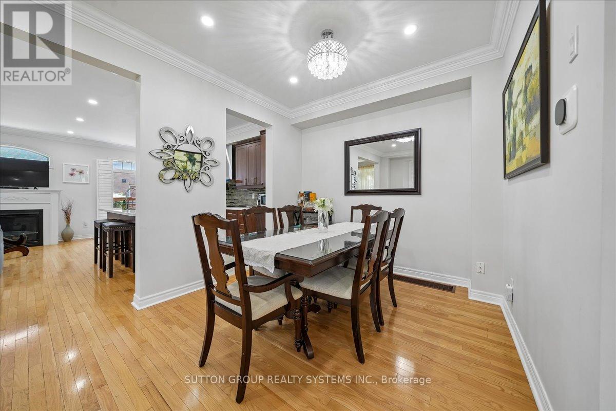 3348 Sunlight Street, Mississauga, ON - Indoor Photo Showing Dining Room With Fireplace