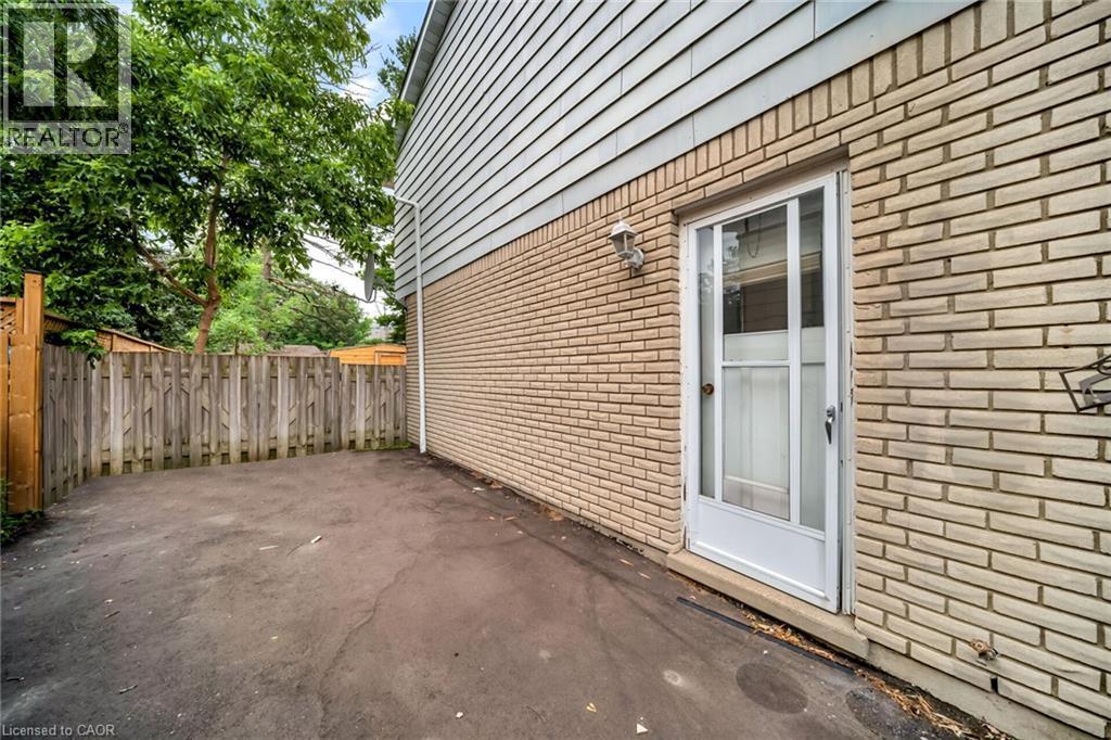 Brick exterior with horizontal siding detail - 53 Burns Drive, Guelph, ON - Outdoor