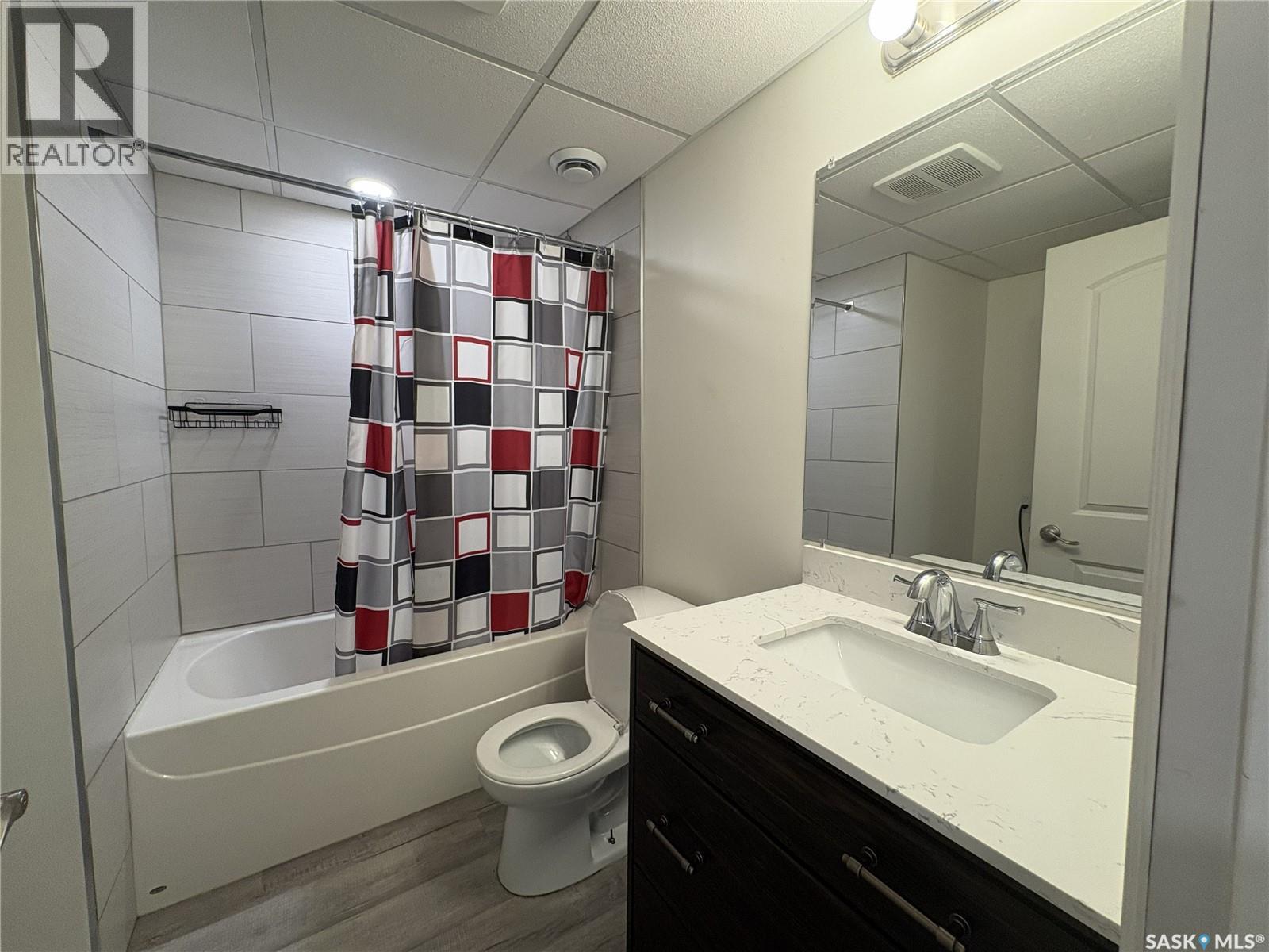 27 Calvert Crescent, Lanigan, SK - Indoor Photo Showing Bathroom