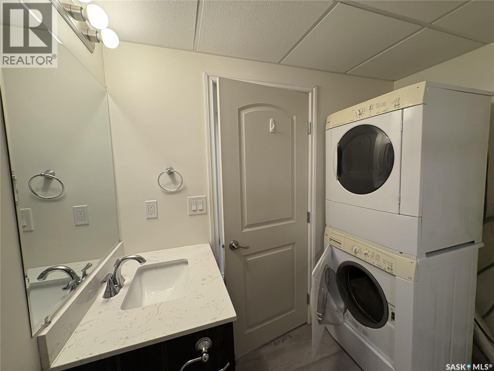 27 Calvert Crescent, Lanigan, SK - Indoor Photo Showing Laundry Room