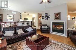 Main-Floor Family Room with 2-Sided Gas Fireplace - 