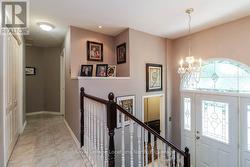 Bright Foyer + Hallway to Bedroom Area - 