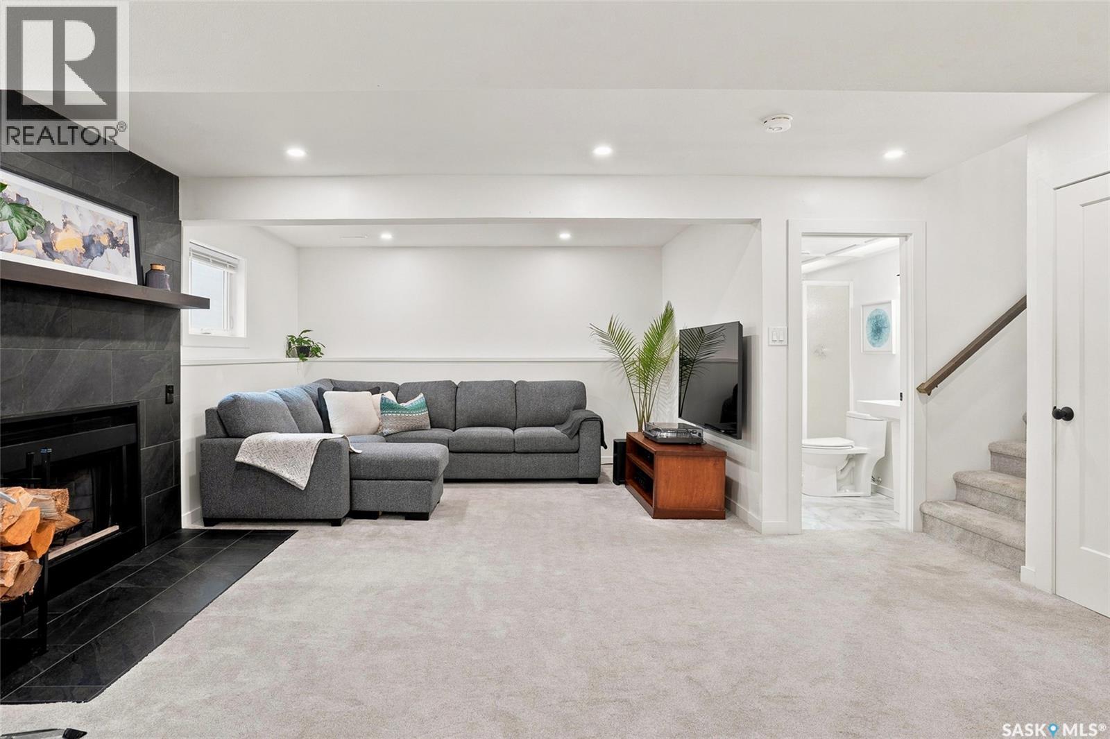 342 Haslam Crescent, Saskatoon, SK - Indoor Photo Showing Living Room With Fireplace