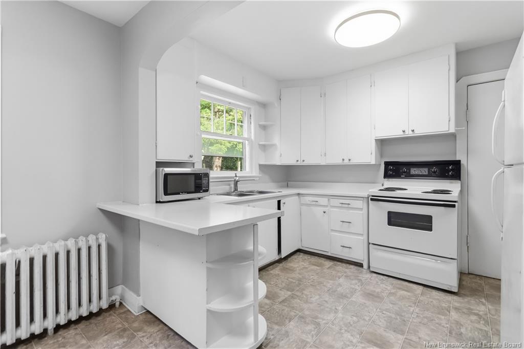 51-53 Lakewood Dr, Moncton, NB - Indoor Photo Showing Kitchen With Double Sink