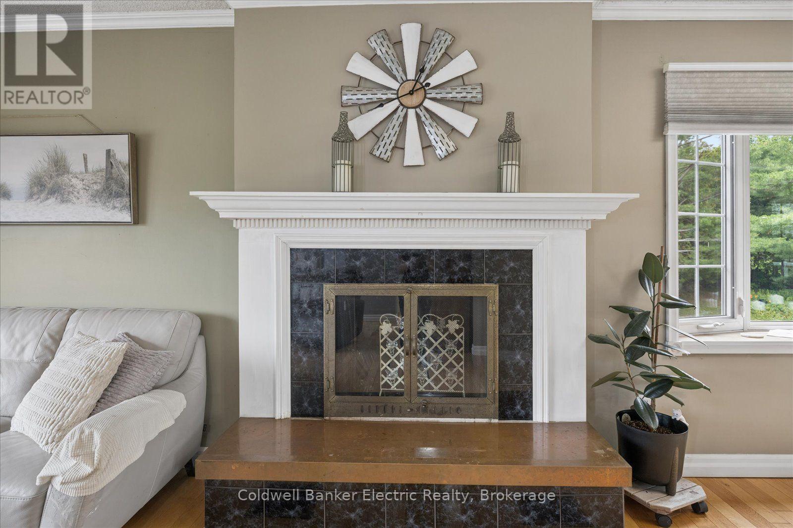 1657 4Th Line, Douro-Dummer, ON - Indoor Photo Showing Living Room With Fireplace