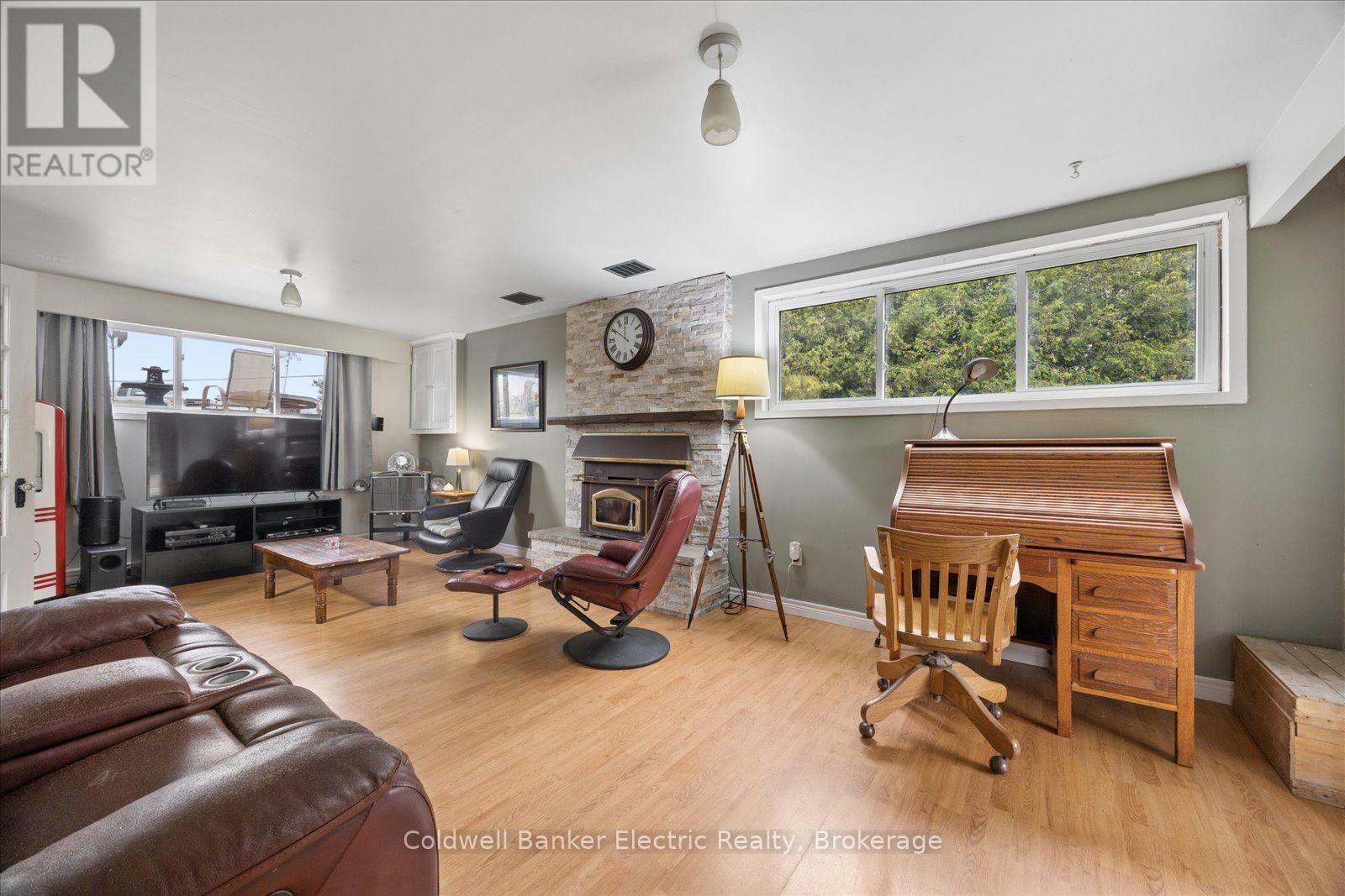 1657 4Th Line, Douro-Dummer, ON - Indoor Photo Showing Living Room With Fireplace