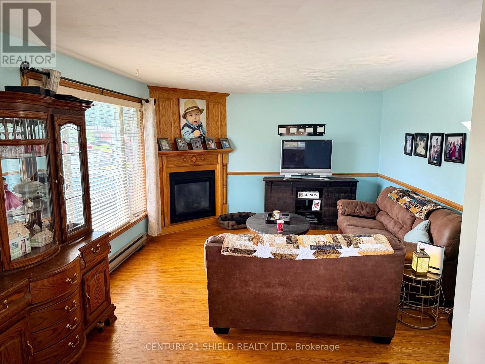 Living room - 785 Sandfield Crescent, Cornwall, ON - Indoor Photo Showing Living Room With Fireplace