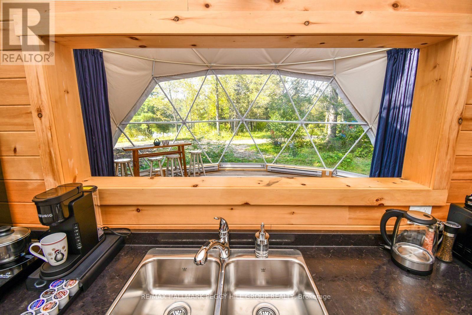 8863 Highway 17 E, Calvin, ON - Indoor Photo Showing Kitchen With Double Sink