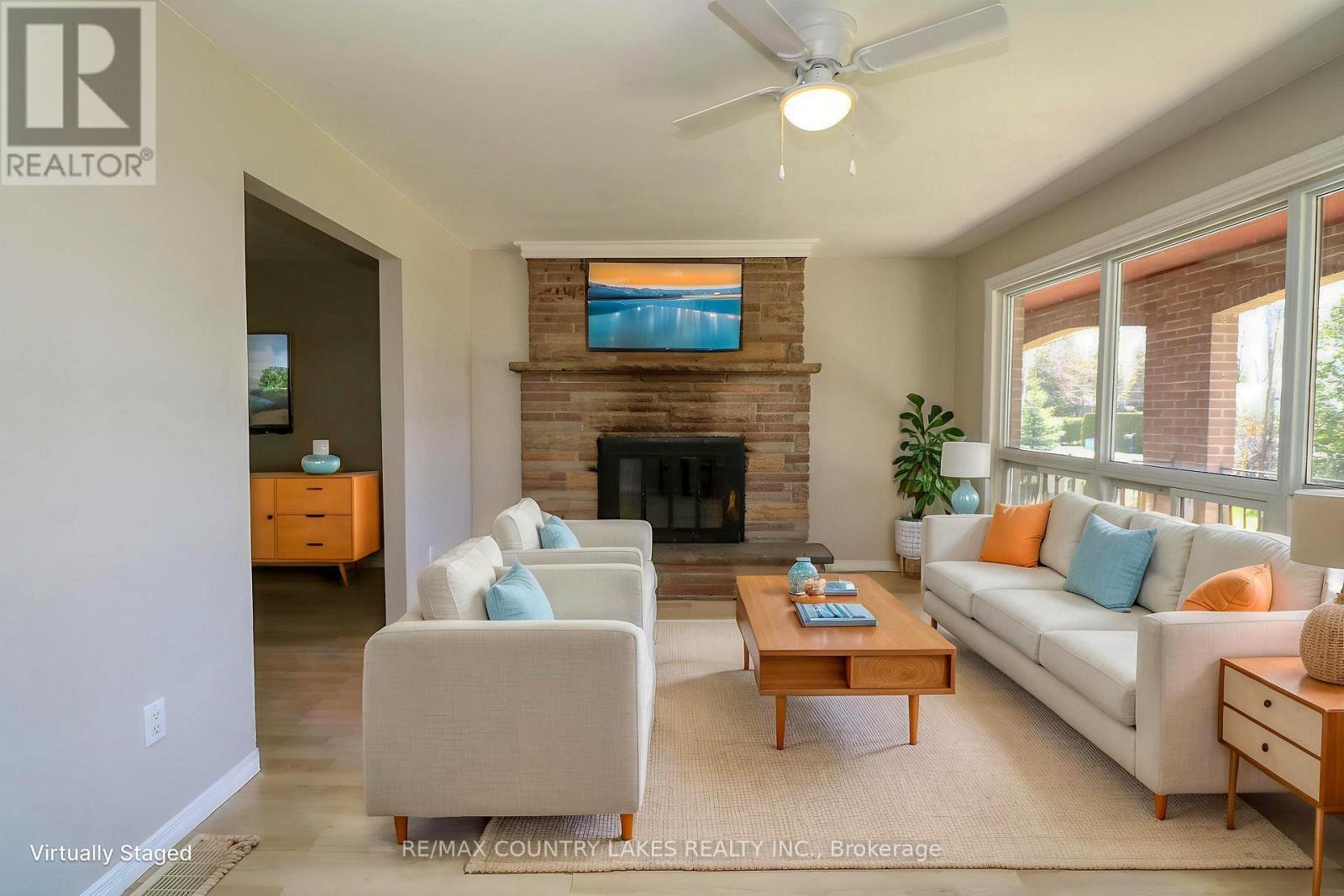 25035/7 Maple Beach Road, Brock, ON - Indoor Photo Showing Living Room With Fireplace