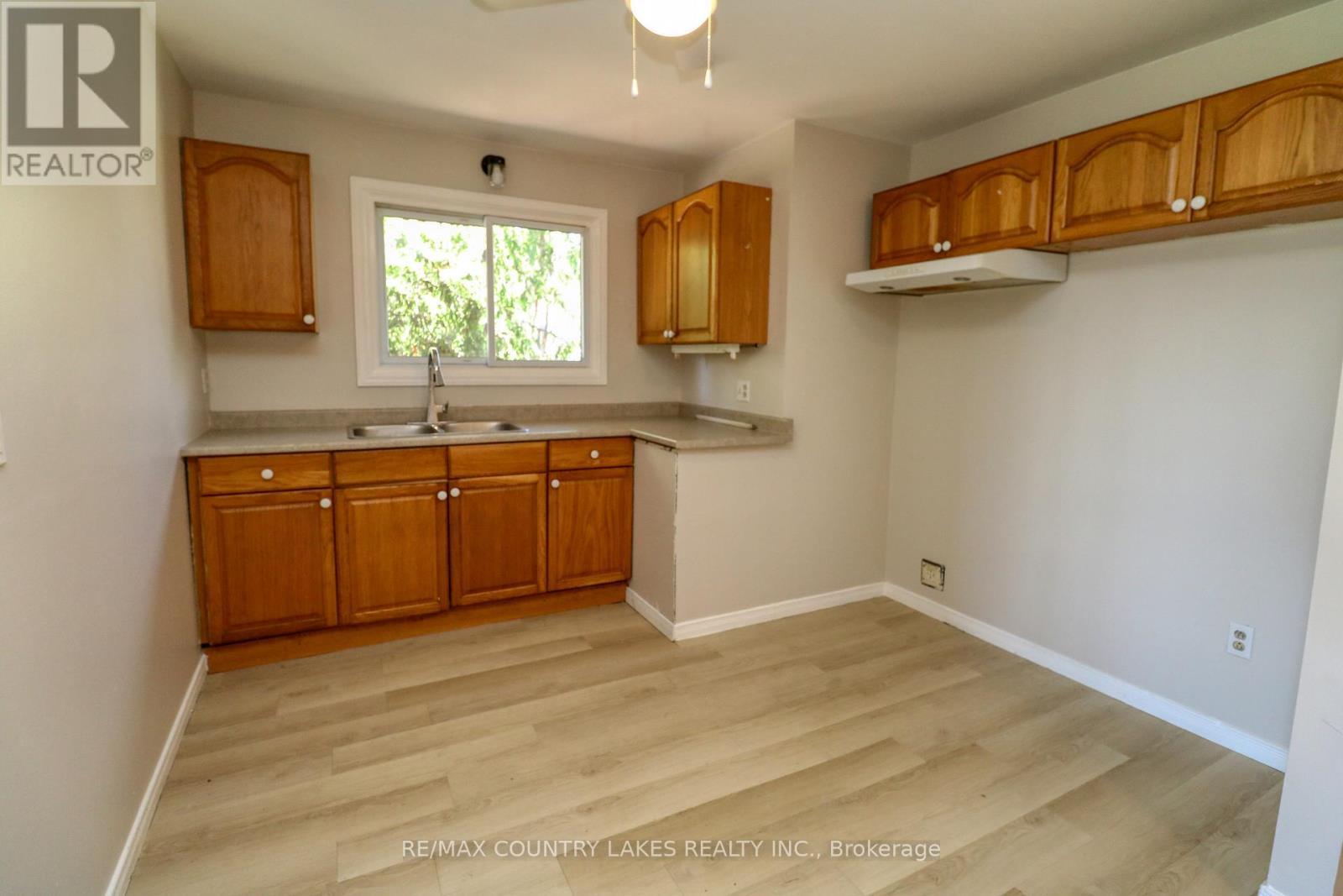 25035/7 Maple Beach Road, Brock, ON - Indoor Photo Showing Kitchen With Double Sink
