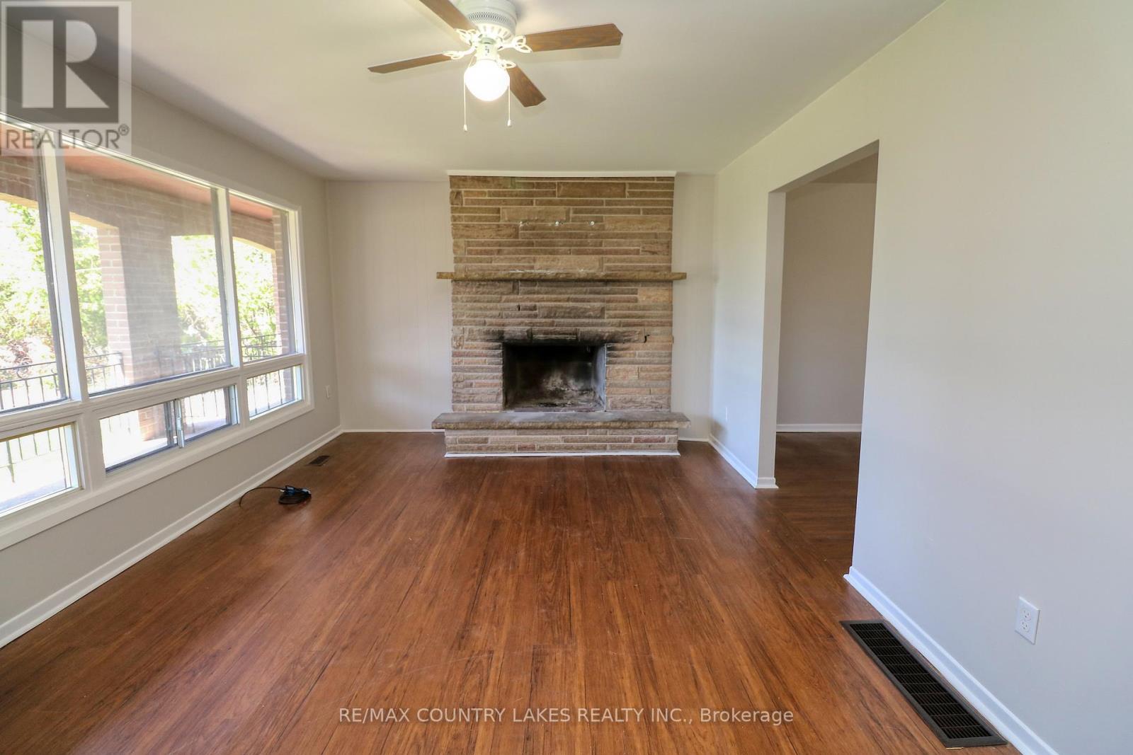25035/7 Maple Beach Road, Brock, ON - Indoor Photo Showing Living Room With Fireplace