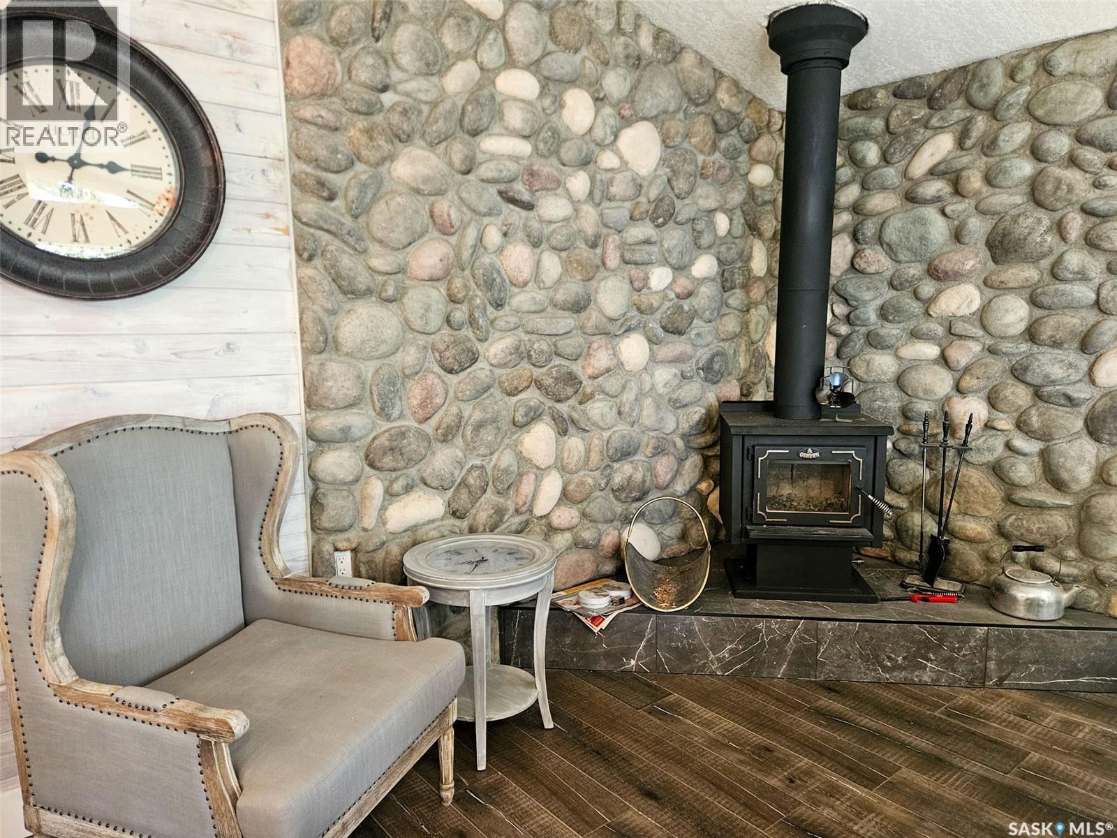 59 Snedden Crescent, Maple Bush Rm No. 224, SK - Indoor With Fireplace