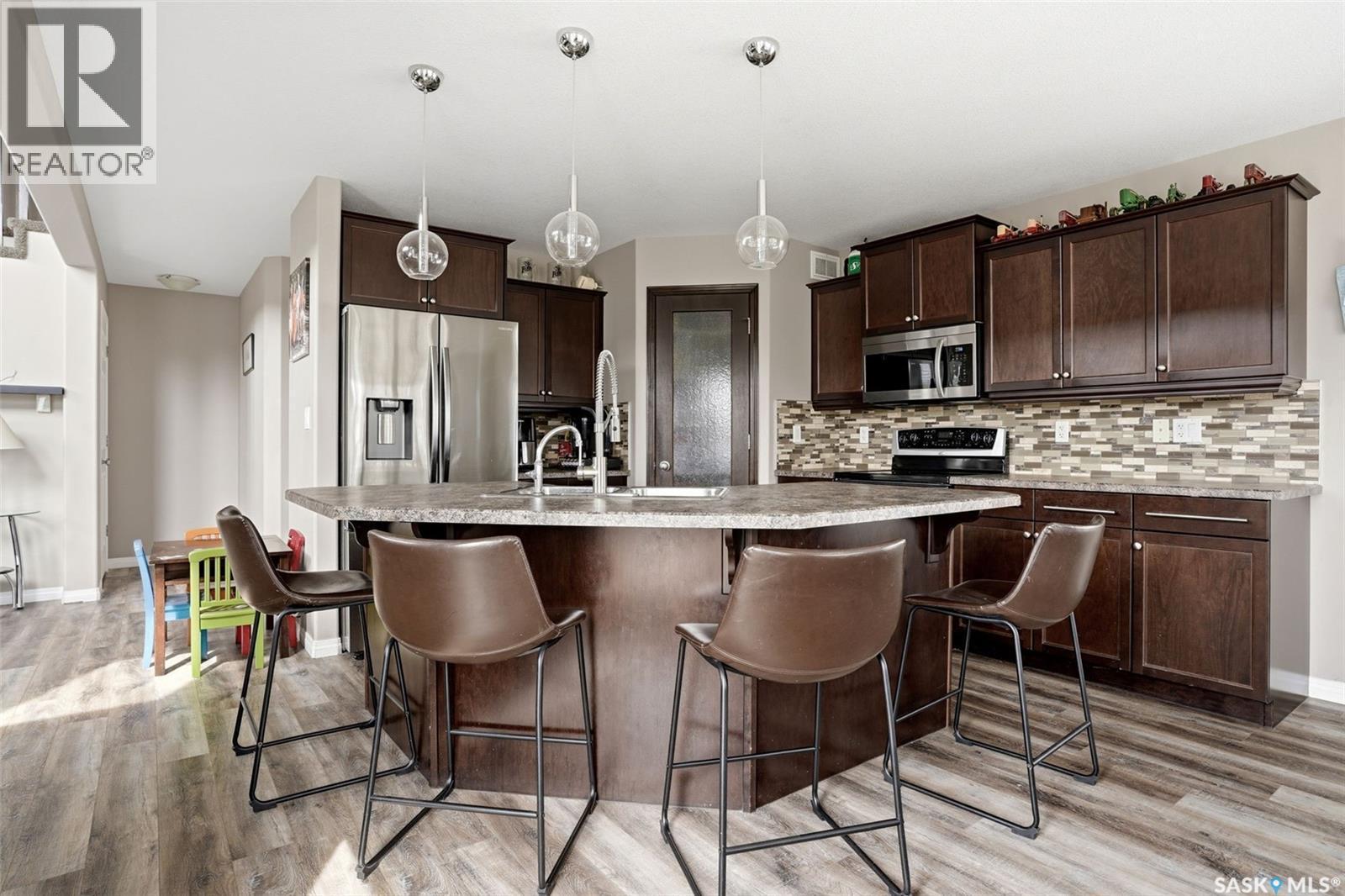9 Mckenzie Pointe, White City, SK - Indoor Photo Showing Kitchen With Upgraded Kitchen