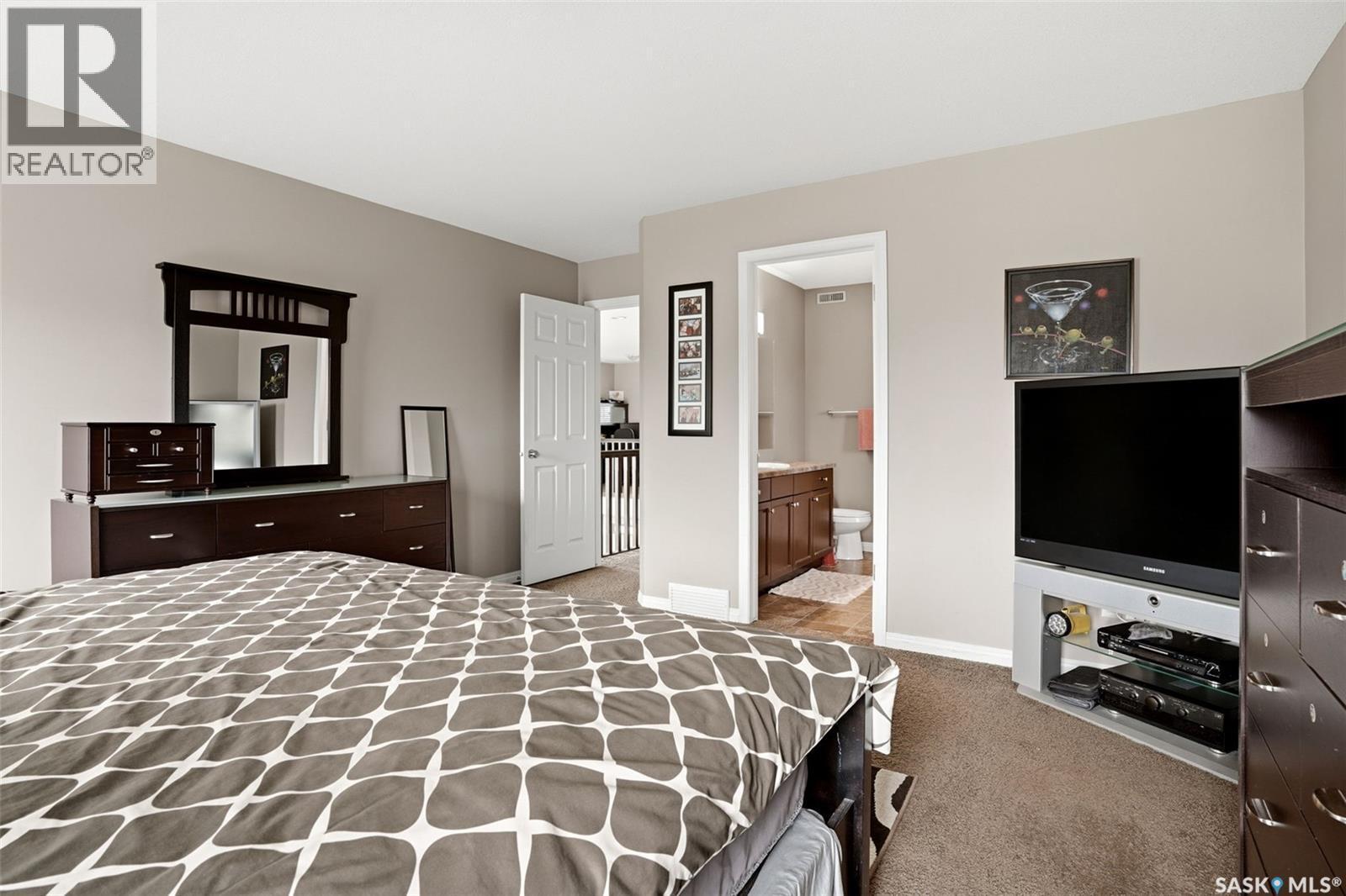 9 Mckenzie Pointe, White City, SK - Indoor Photo Showing Bedroom