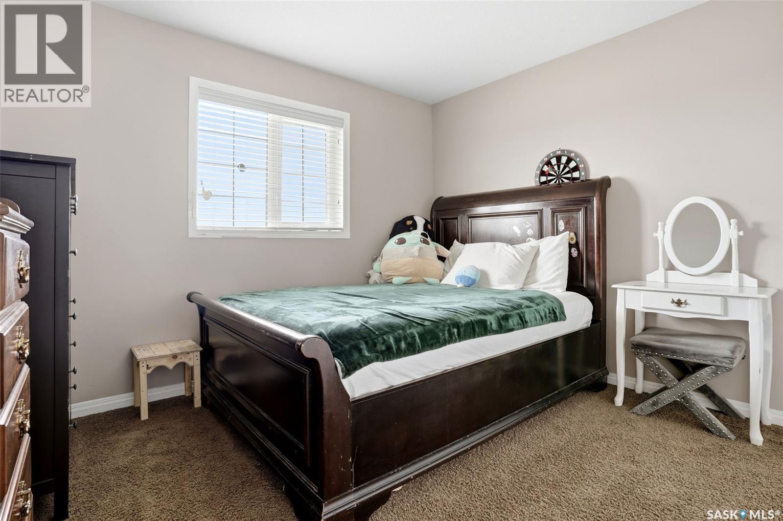 9 Mckenzie Pointe, White City, SK - Indoor Photo Showing Bedroom