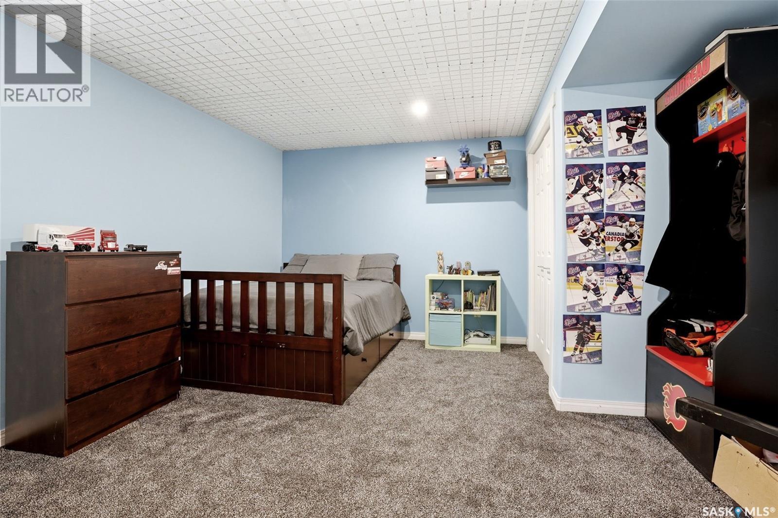 9 Mckenzie Pointe, White City, SK - Indoor Photo Showing Bedroom